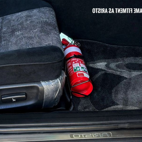 Toyota Aristo / Lexus GS cabin with a red fire extinguisher mounted on a KAP bracket at the base of the front seat