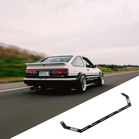 1985-1987 Toyota Corolla AE86 with the vehicle-specific KAP fire extinguisher bracket shown inset